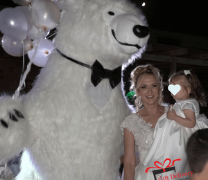 The White Polar Bear came to the wedding to deliver the gift to the bride and groom. Gift Delivery. Wedding gift. Polar bear surprise. White Polar Bear at the wedding.